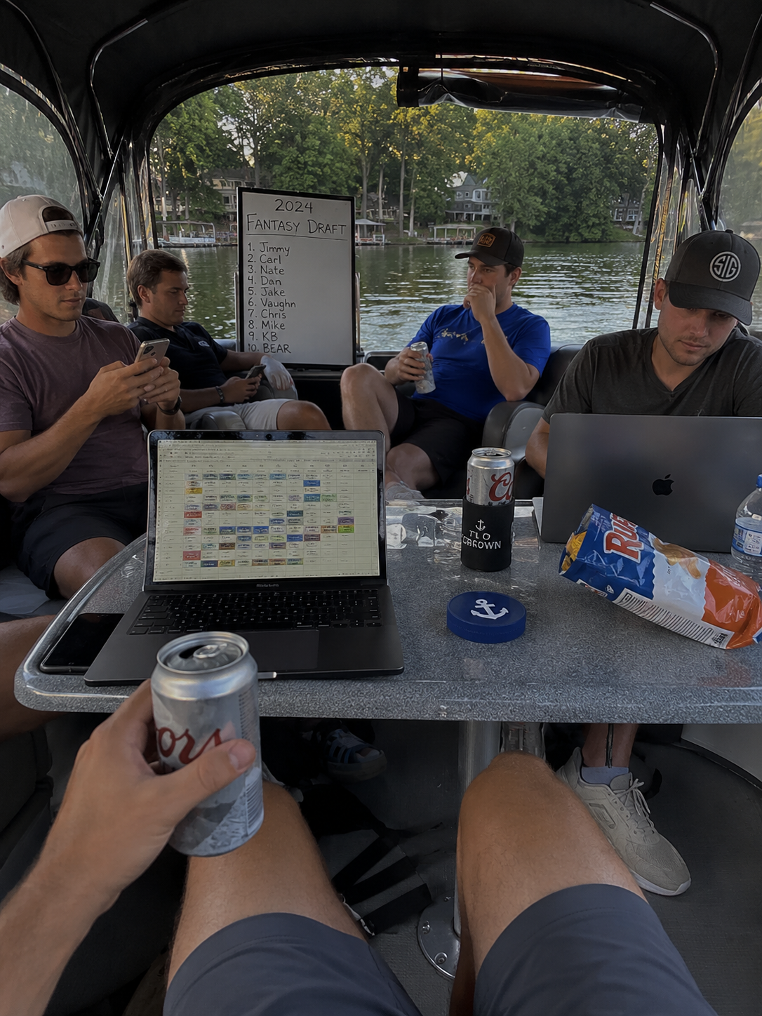 The Commodore tin on the pontoon during a fantasy football draft