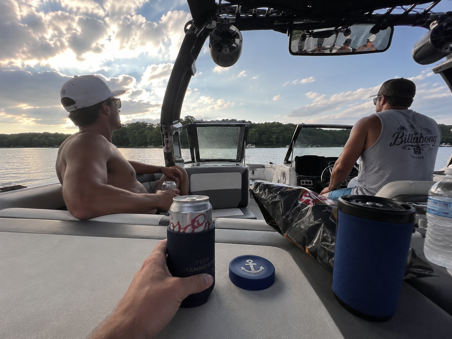 The Commodore tin on the boat at sunset