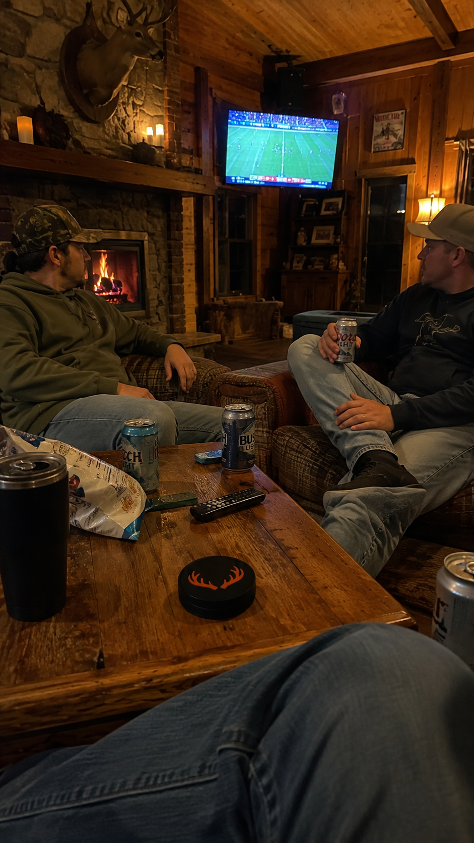 The Lodge tin on the coffee table by the cabin fireplace