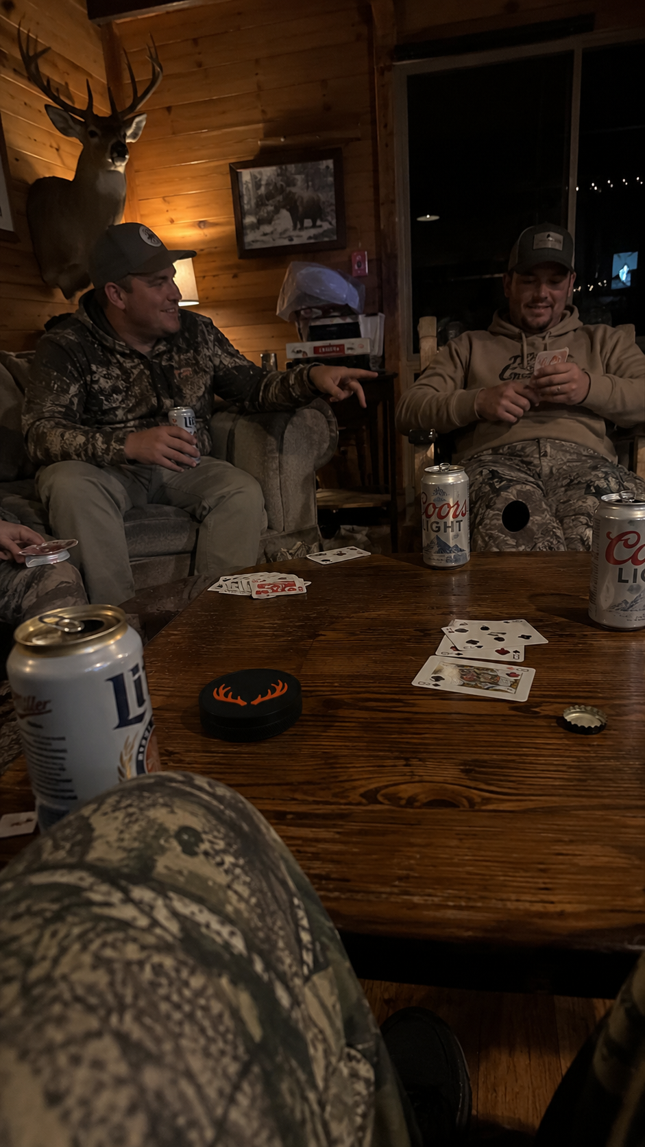 The Lodge tin on the card table at the hunting cabin